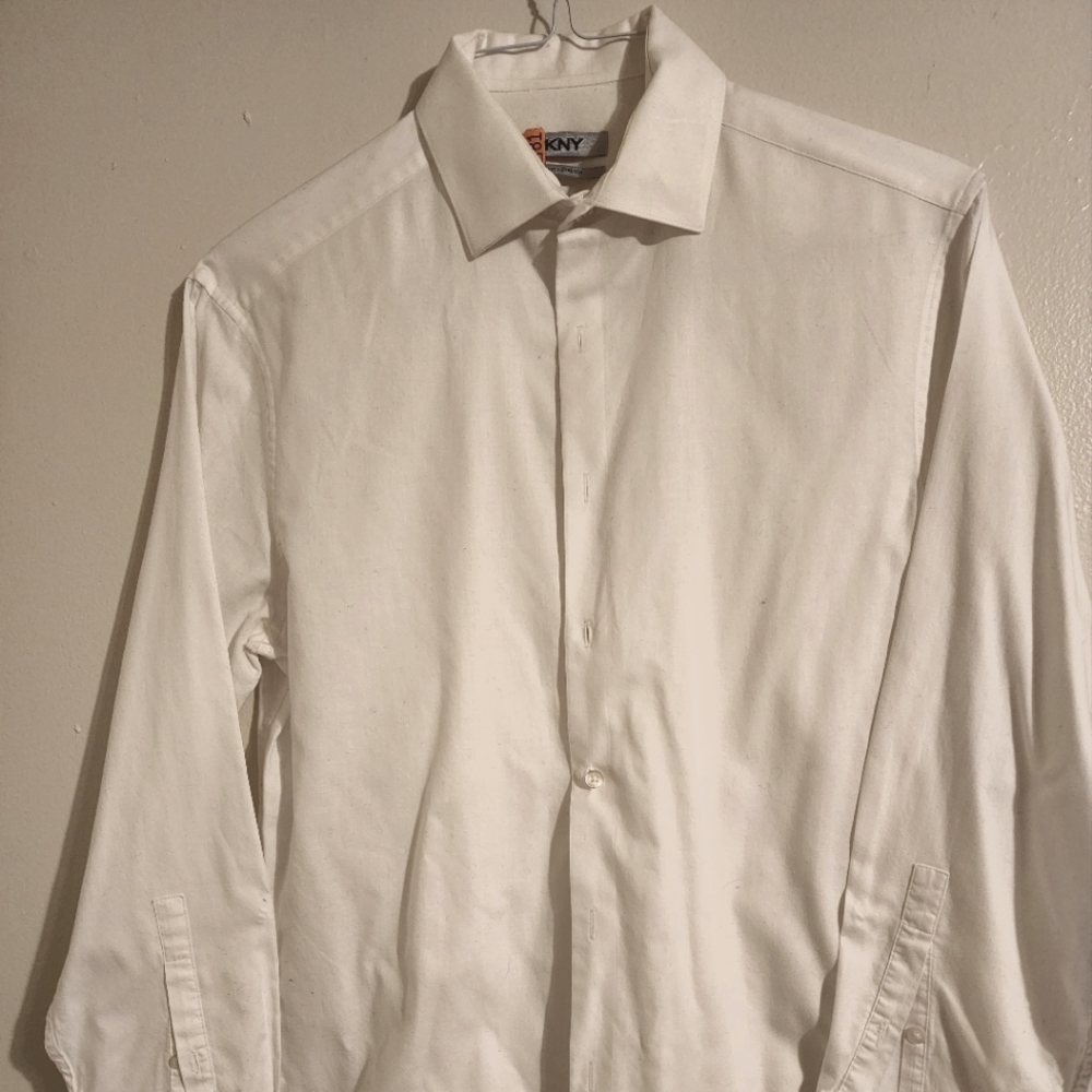 Men's DKNY white, long sleeve dress shirt. Size 15 collar (32/33). DRY CLEANED.